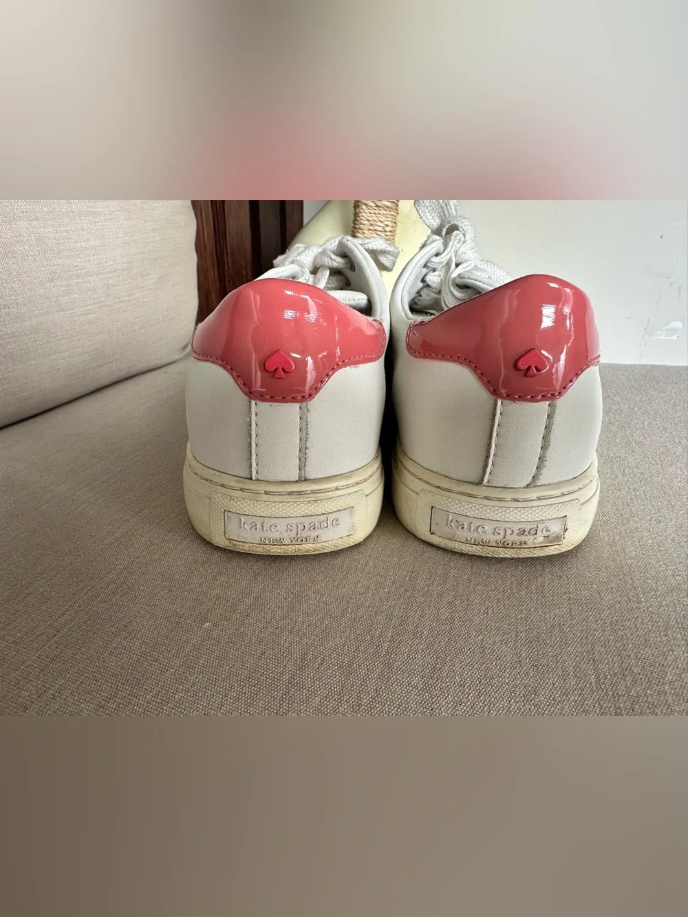 Kate spade Women's White Leather Sneakers with Pink Heel Accent